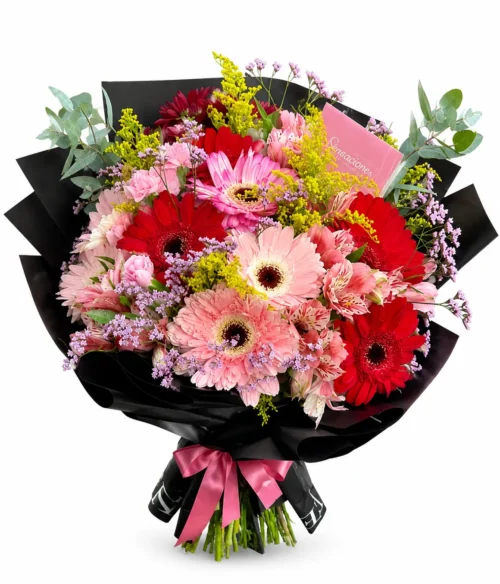 Ramo de 18 gerberas con frase y complemento